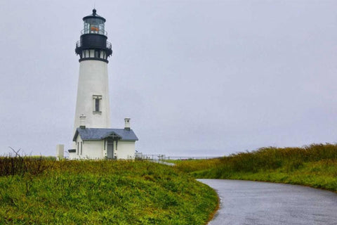 USA, Oregon Yaquina Head Lighthouse on foggy day Black Ornate Wood Framed Art Print with Double Matting by Carter, Jean