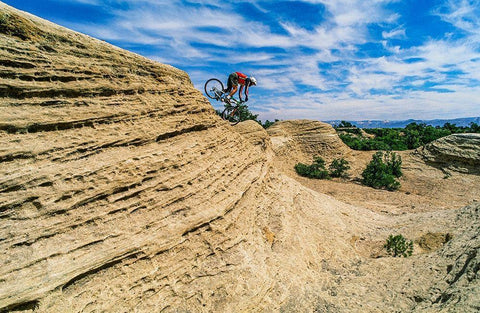 Mountain biker balances courage and danger and attempting to avoid crash on Red Rock-Utah-USA (MR) Black Ornate Wood Framed Art Print with Double Matting by Garber, Howie