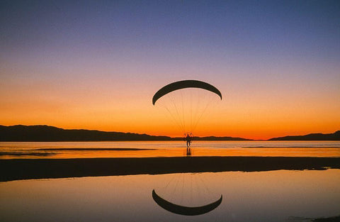 Paraglider over the Great Salt Lake-Utah at sunset White Modern Wood Framed Art Print with Double Matting by Garber, Howie