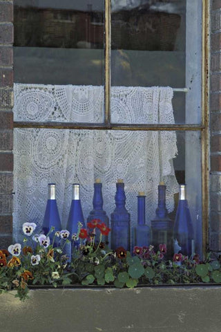 WA, Palouse Row of blue bottles and flowers Black Ornate Wood Framed Art Print with Double Matting by Grall, Don