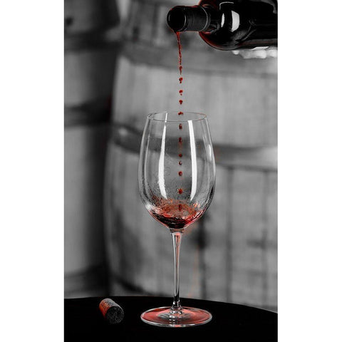 Red wine pouring into is captured in mid-air before it touches wine glass Black Modern Wood Framed Art Print by Duval, Richard