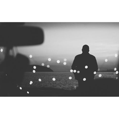 Silhouette Traveler On The Background Of The Water In Evening Black Modern Wood Framed Art Print with Double Matting by Sumarokov, Aleksandr