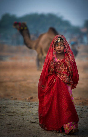 Nomad Girl In Red Dress Black Ornate Wood Framed Art Print with Double Matting by Jabeen, Rana