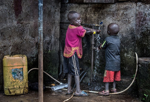 Surmi Tribe Children Cleaning Their Hands Before Starting To Eat - Ethiopia White Modern Wood Framed Art Print with Double Matting by Inazio Kuesta, Joxe