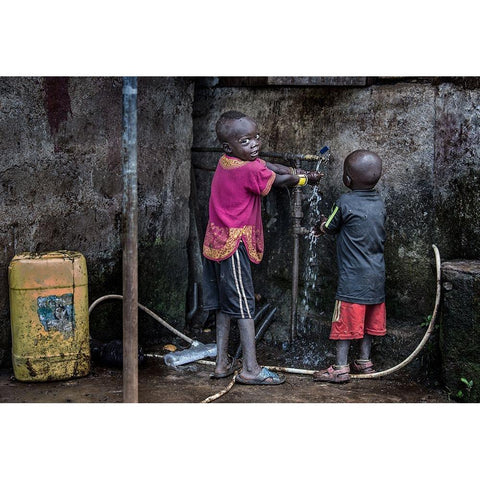 Surmi Tribe Children Cleaning Their Hands Before Starting To Eat - Ethiopia Black Modern Wood Framed Art Print with Double Matting by Inazio Kuesta, Joxe