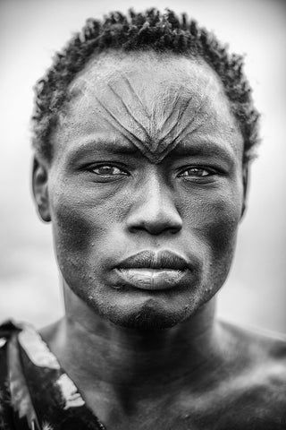 The Face Of The Mundari White Modern Wood Framed Art Print with Double Matting by Cole, Trevor