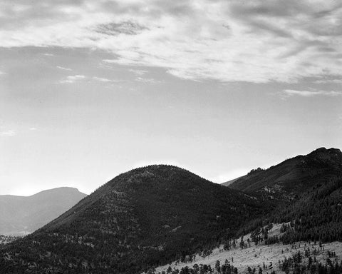 View of hill with trees, clouded sky, in Rocky Mountain National Park, Colorado, ca. 1941-1942 White Modern Wood Framed Art Print with Double Matting by Adams, Ansel