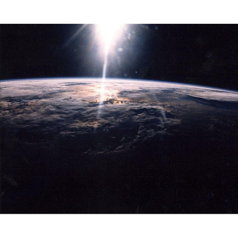 Sunlight over Earth as seen by Discovery crew Gold Ornate Wood Framed Art Print with Double Matting by NASA