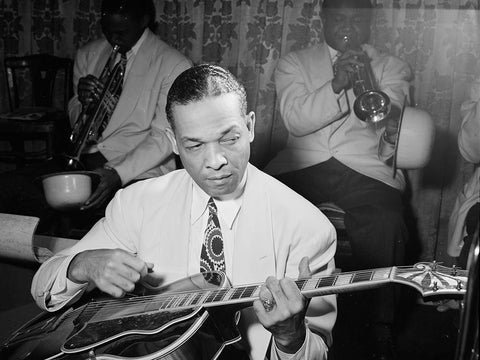 Fred Guy playing guitar at the Aquarium-New York 1946 White Modern Wood Framed Art Print with Double Matting by Gottlieb, William