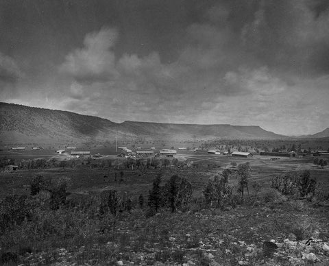 Distant view of Camp Apache-Arizona White Modern Wood Framed Art Print with Double Matting by OSullivan, Timothy H