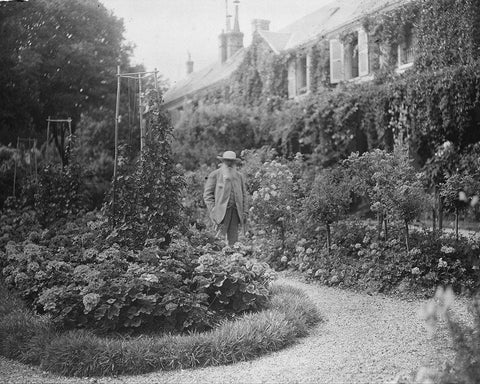 Claude Monet at his House at Giverny 1921 Black Ornate Wood Framed Art Print with Double Matting by Vintage Photography