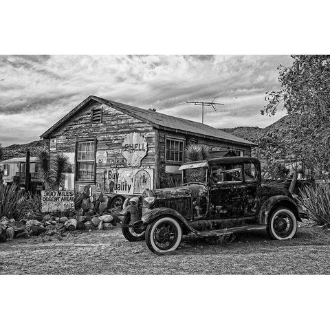 Vintage Car in Front of Old Gas Station Black Modern Wood Framed Art Print with Double Matting by Vintage Photo Archive