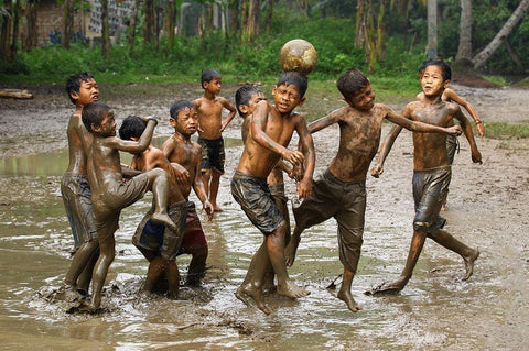 Playing Football Black Ornate Wood Framed Art Print with Double Matting by Muliani Hartojo, Angela