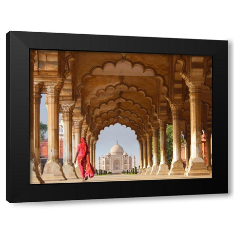 Woman in traditional Sari walking towards Taj Mahal Black Modern Wood Framed Art Print by Pangea Images