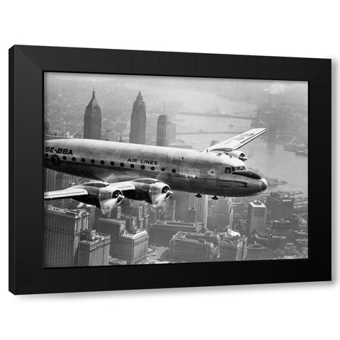 Aircraft Flying over City 1946 Black Modern Wood Framed Art Print by Anonymous