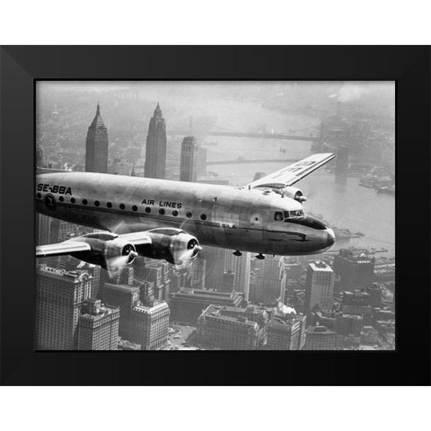 Aircraft Flying over City 1946 Black Modern Wood Framed Art Print by Anonymous