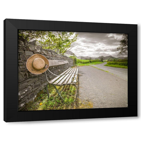 Bench with a hat on countryside road Black Modern Wood Framed Art Print by Frank, Assaf
