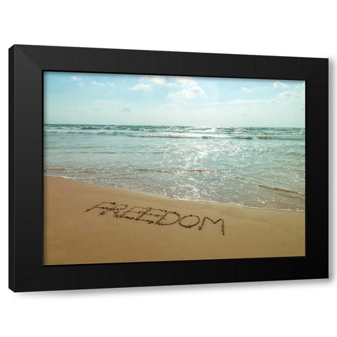 Word Freedom written in sand on the beach Black Modern Wood Framed Art Print by Frank, Assaf