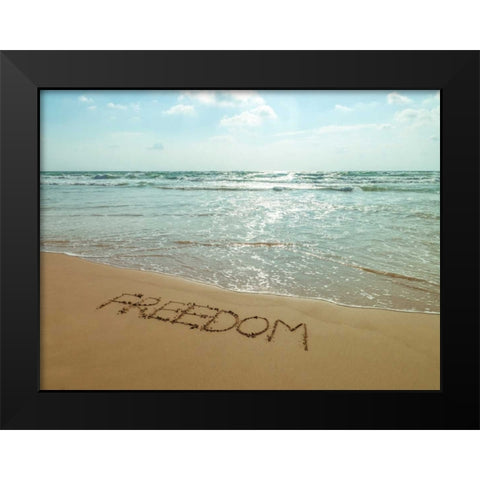 Word Freedom written in sand on the beach Black Modern Wood Framed Art Print by Frank, Assaf