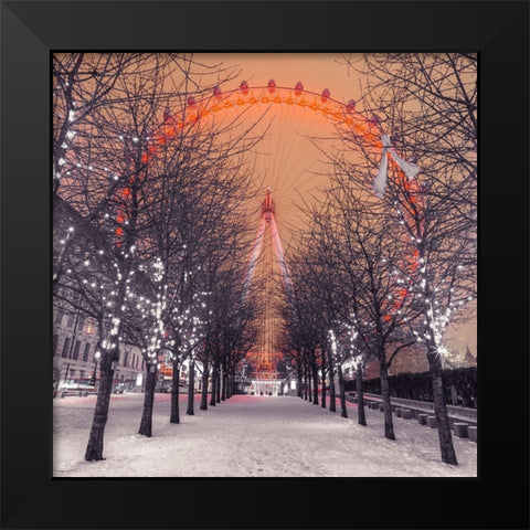 London Eye at night with trees in the foreground lit with lights and snow on the pathway-London-UK Black Modern Wood Framed Art Print by Frank, Assaf