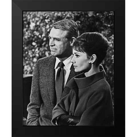Cary Grant with Audrey Hepburn - Charade Black Modern Wood Framed Art Print by Hollywood Photo Archive