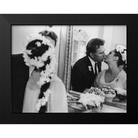 Elizabeth Taylor and Richard Burton in 1964 Black Modern Wood Framed Art Print by Hollywood Photo Archive