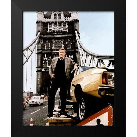 John Wayne - Brannigan Black Modern Wood Framed Art Print by Hollywood Photo Archive