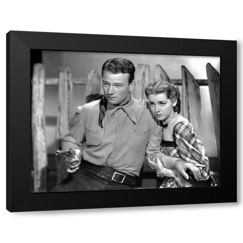 John Wayne Black Modern Wood Framed Art Print with Double Matting by Hollywood Photo Archive