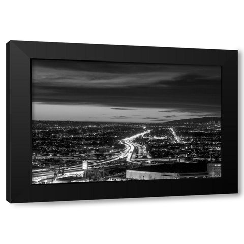 Dusk skyline view of Los Angeles California looking west over the Santa Monica freeway Black Modern Wood Framed Art Print by Highsmith, Carol