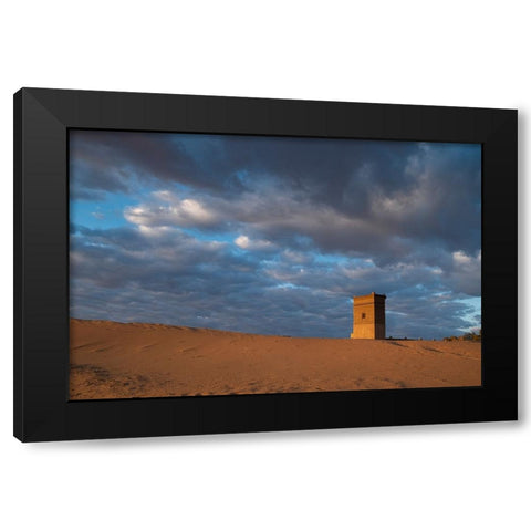 Water tower glows orange in sunrise light. Black Modern Wood Framed Art Print by Sederquist, Betty