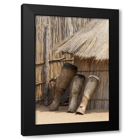 Namibia, Caprivi Strip Tribal drums lean on hut Black Modern Wood Framed Art Print by Kaveney, Wendy