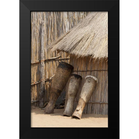 Namibia, Caprivi Strip Tribal drums lean on hut Black Modern Wood Framed Art Print by Kaveney, Wendy