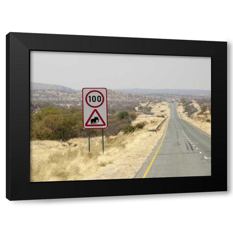 Namibia, Etosha NP Speed limit and caution sign Black Modern Wood Framed Art Print with Double Matting by Kaveney, Wendy