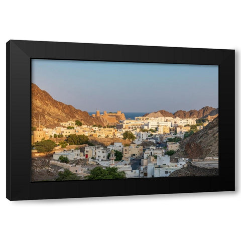 Middle East-Arabian Peninsula-Oman-Muscat-Sunset view of a neighborhood in the hills of Muscat Black Modern Wood Framed Art Print by Wilson, Emily M.