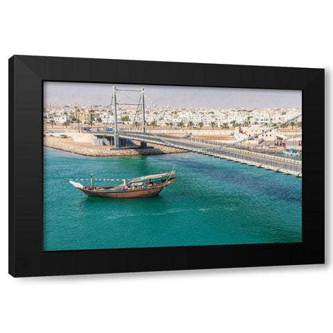 Middle East-Arabian Peninsula-Oman-Al Batinah South-Dhow passing under a suspension bridge Black Modern Wood Framed Art Print by Wilson, Emily M.