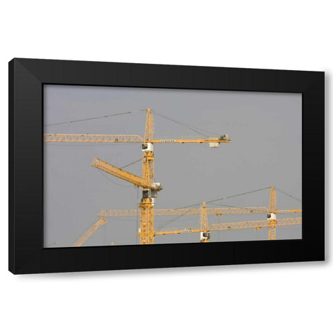 UAE, Dubai, Marina Yellow construction cranes Black Modern Wood Framed Art Print with Double Matting by Young, Bill