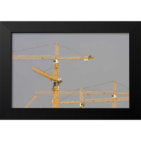 UAE, Dubai, Marina Yellow construction cranes Black Modern Wood Framed Art Print by Young, Bill