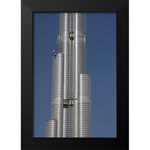 UAE, Dubai Tall skyscraper under construction Black Modern Wood Framed Art Print by Young, Bill
