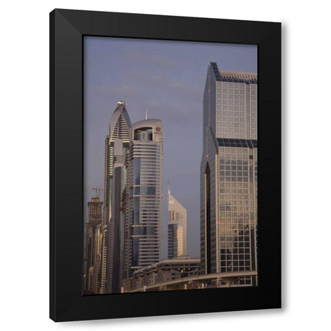 UAE, Dubai Towers along Sheik Zayed Road Black Modern Wood Framed Art Print with Double Matting by Young, Bill
