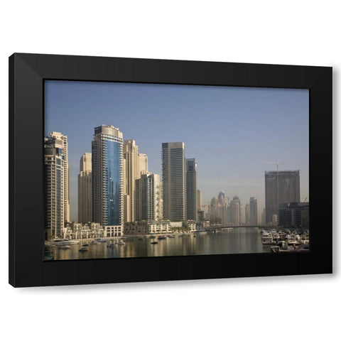 UAE, Dubai Marina towers with boats at anchor Black Modern Wood Framed Art Print with Double Matting by Young, Bill