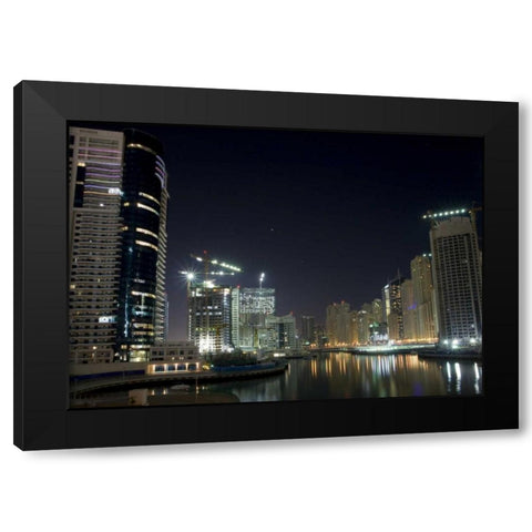 UAE, Dubai Towers on marina at night Black Modern Wood Framed Art Print with Double Matting by Young, Bill