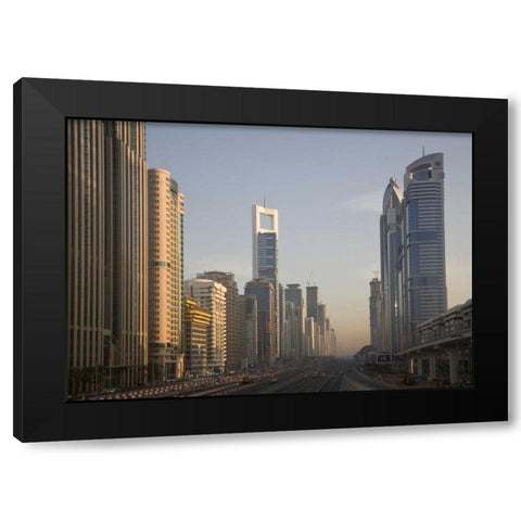 UAE, Dubai Towers along Sheik Zayed Road Black Modern Wood Framed Art Print by Young, Bill