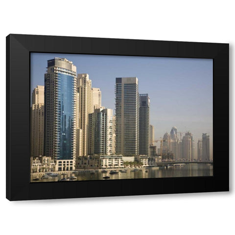 UAE, Dubai Marina towers with boats at anchor Black Modern Wood Framed Art Print by Young, Bill