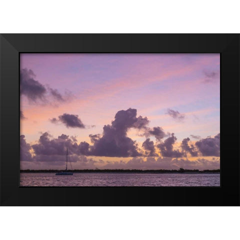 Bahamas, Exuma Is Sailboat anchored at sunset Black Modern Wood Framed Art Print by Paulson, Don