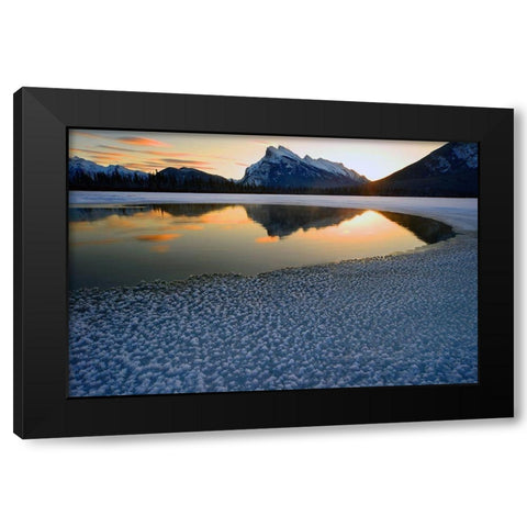 Snow crystals rim a lone break in the ice on Vermilion Lakes on a cold Banff National Park winter mo Black Modern Wood Framed Art Print by Steve Mohlenkamp