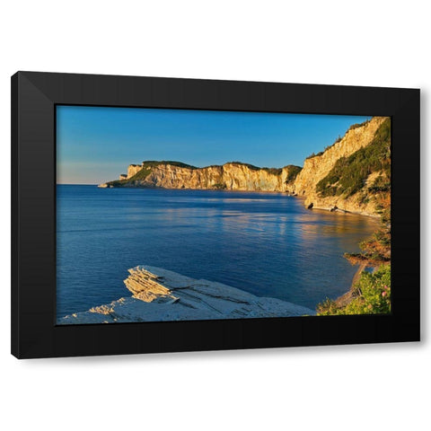 Canada-Quebec-Forillon National Park Limestone cliffs along Gulf of St Lawrence at sunrise Black Modern Wood Framed Art Print by Jaynes Gallery
