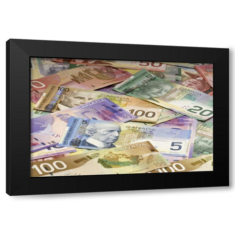 Close-up of assorted Canadian paper currency Black Modern Wood Framed Art Print by Flaherty, Dennis