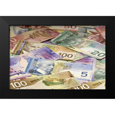 Close-up of assorted Canadian paper currency Black Modern Wood Framed Art Print by Flaherty, Dennis