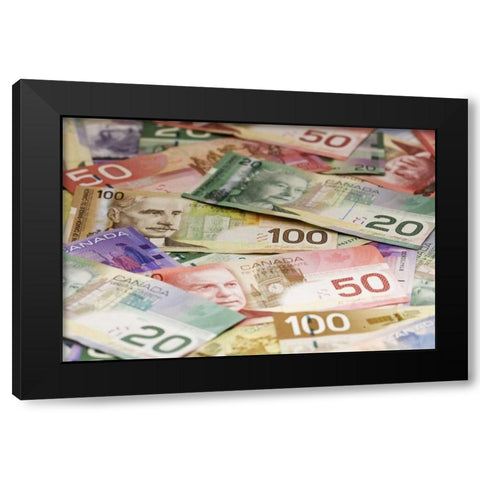 Close-up of assorted Canadian paper currency Black Modern Wood Framed Art Print by Flaherty, Dennis