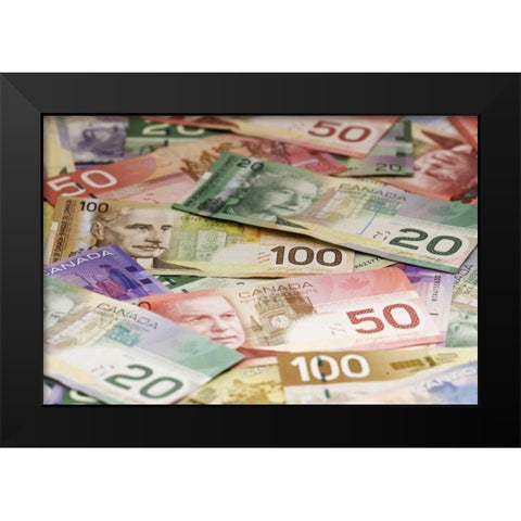 Close-up of assorted Canadian paper currency Black Modern Wood Framed Art Print by Flaherty, Dennis